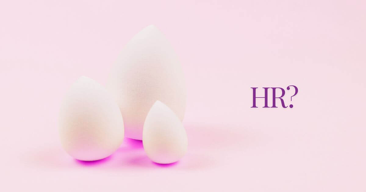 image of three stylised eggs with a pinkish purpleish glow