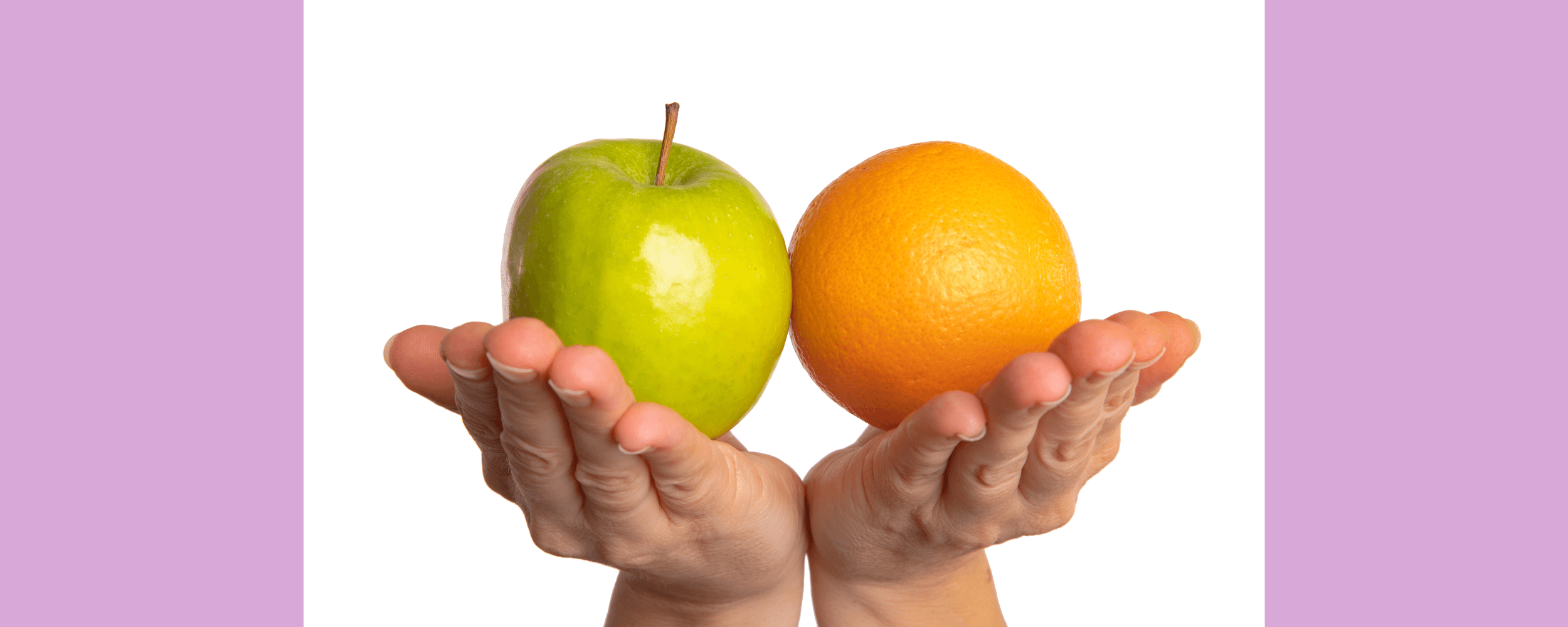 Two hands holding an apple and an orange