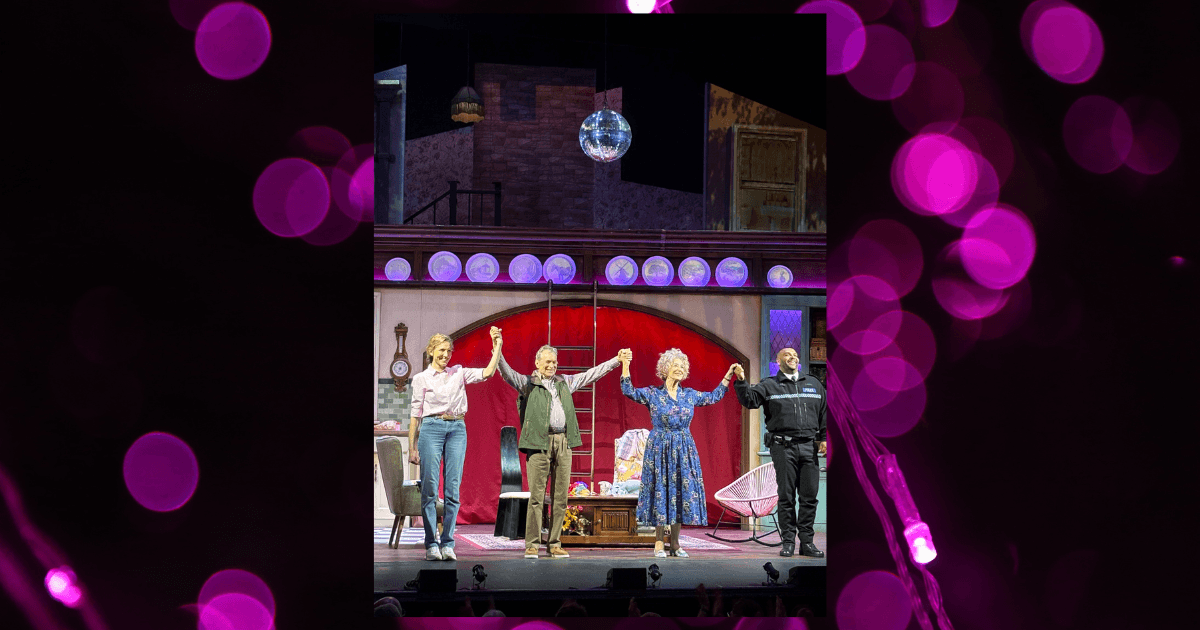 Cast on a stage taking a bow