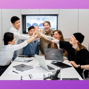 Team of employees clapping their hands today surrounded by a purple boarder.